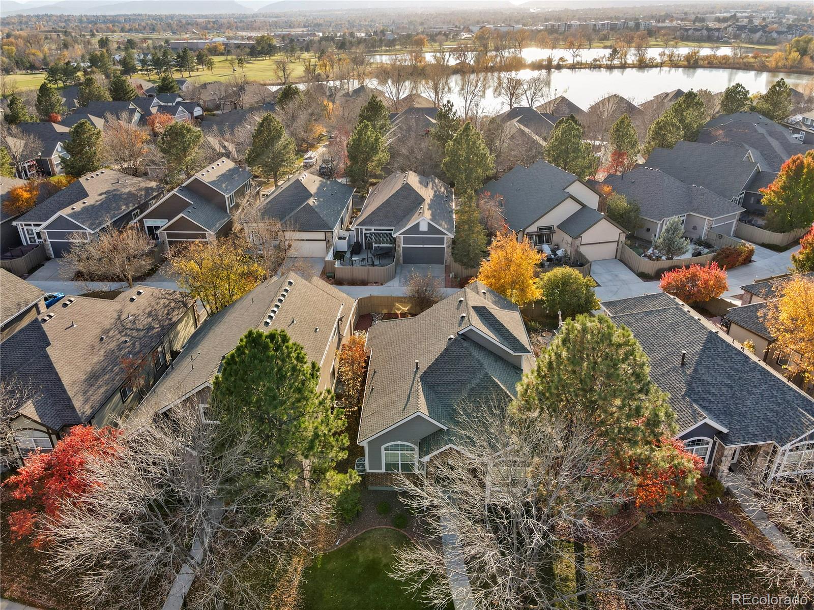 6900 West Grant Ranch Boulevard, Unit 53 Littleton, CO 80123 - Photo 31 of 31 an aerial view of a house with outdoor space