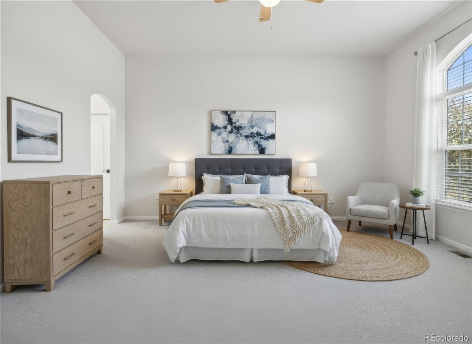 6900 West Grant Ranch Boulevard, Unit 53 Littleton, CO 80123 - Photo 9 of 31 a bedroom with a bed and window