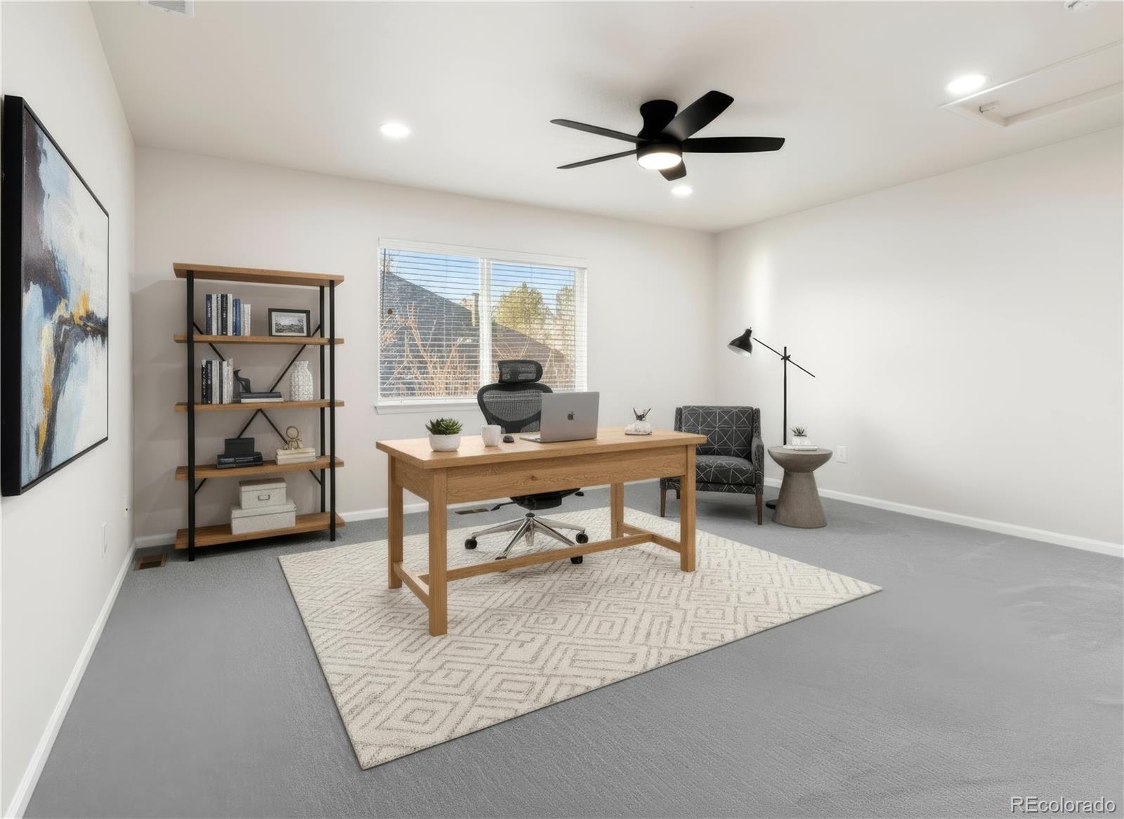 6900 West Grant Ranch Boulevard, Unit 53 Littleton, CO 80123 - Photo 10 of 31 a living room with furniture and a window