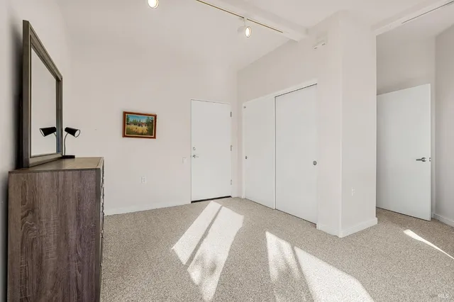 a view of a town with mountains in the background