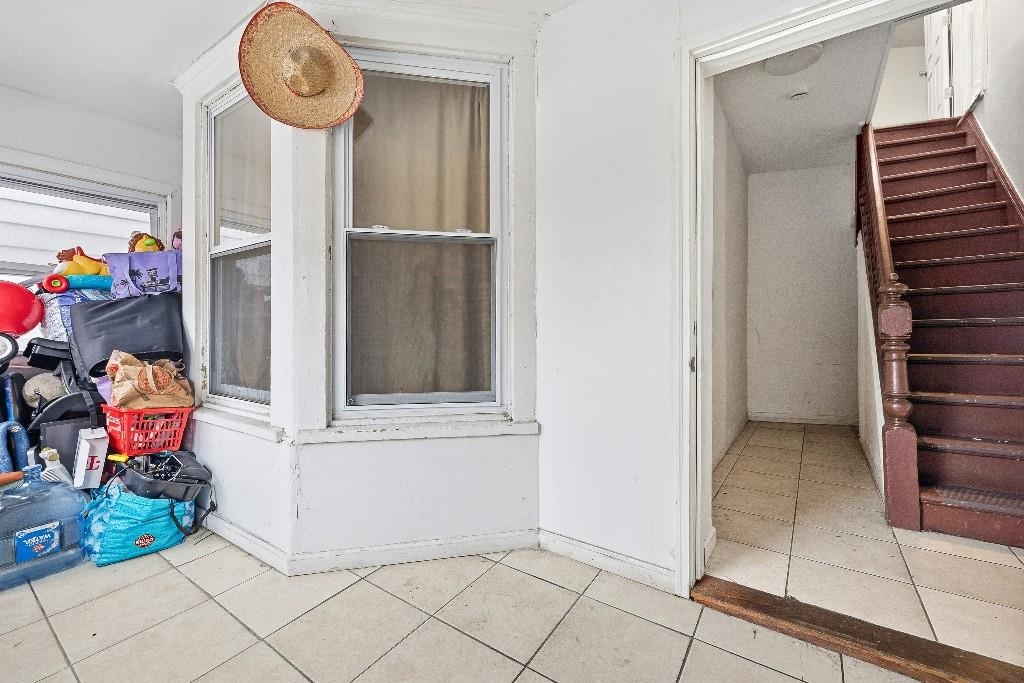 383 Broadway Passaic, NJ 07055 - Photo 3 of 21 a view of entryway with wooden floor