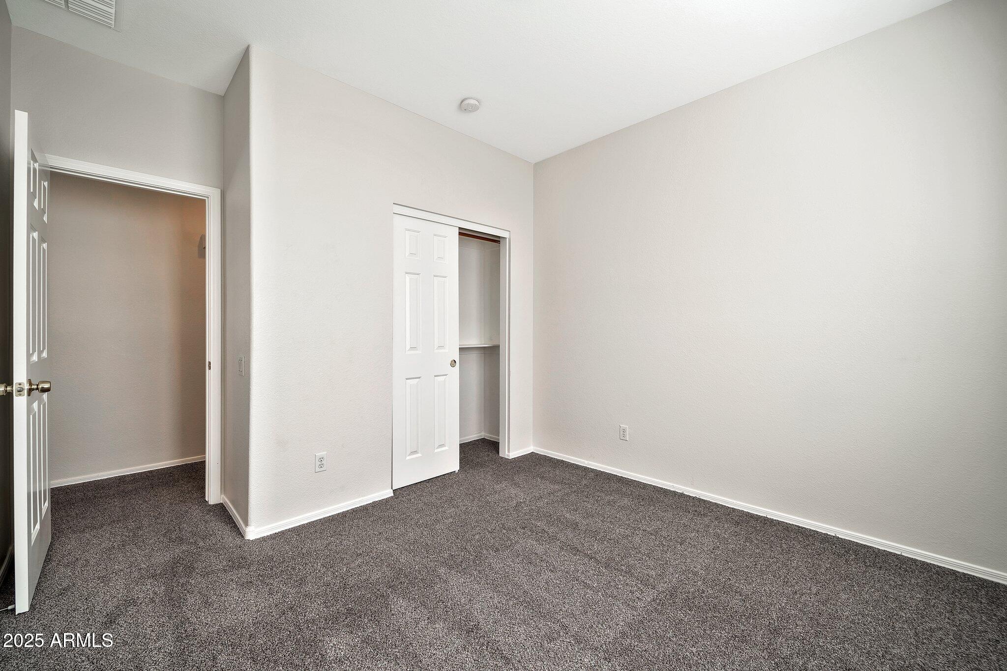 9437 West Berkeley Road Phoenix, AZ 85037 - Photo 11 of 21 a view of an empty room