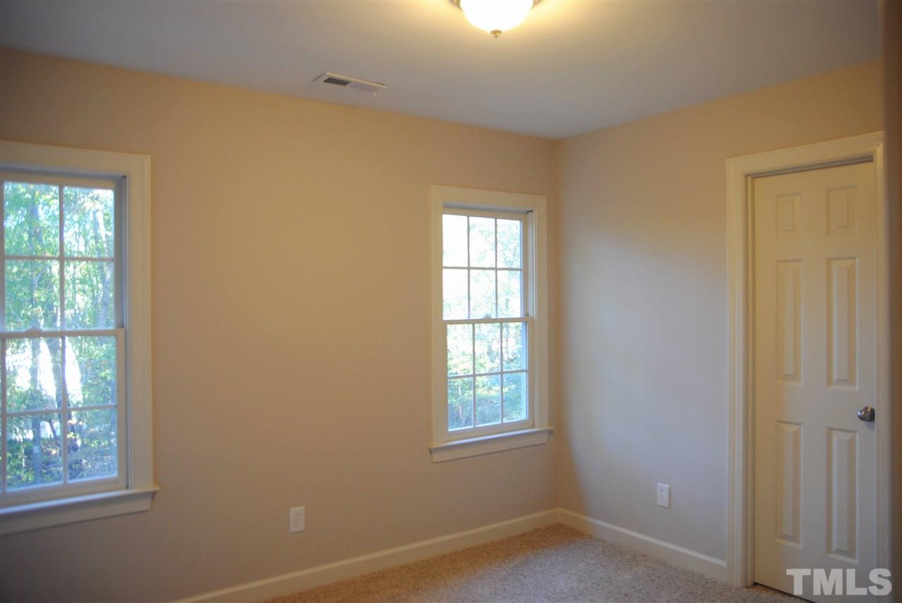 2004 Vintners Court Raleigh, NC 27610 - Photo 11 of 16 an empty room with windows