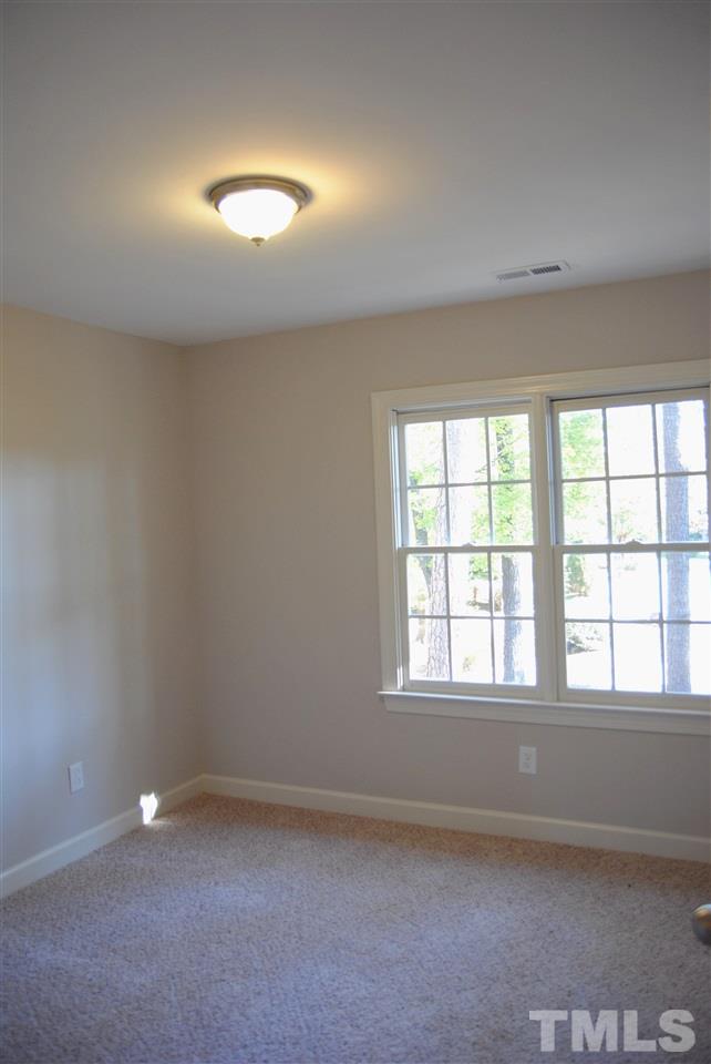 2004 Vintners Court Raleigh, NC 27610 - Photo 12 of 16 an empty room with a window