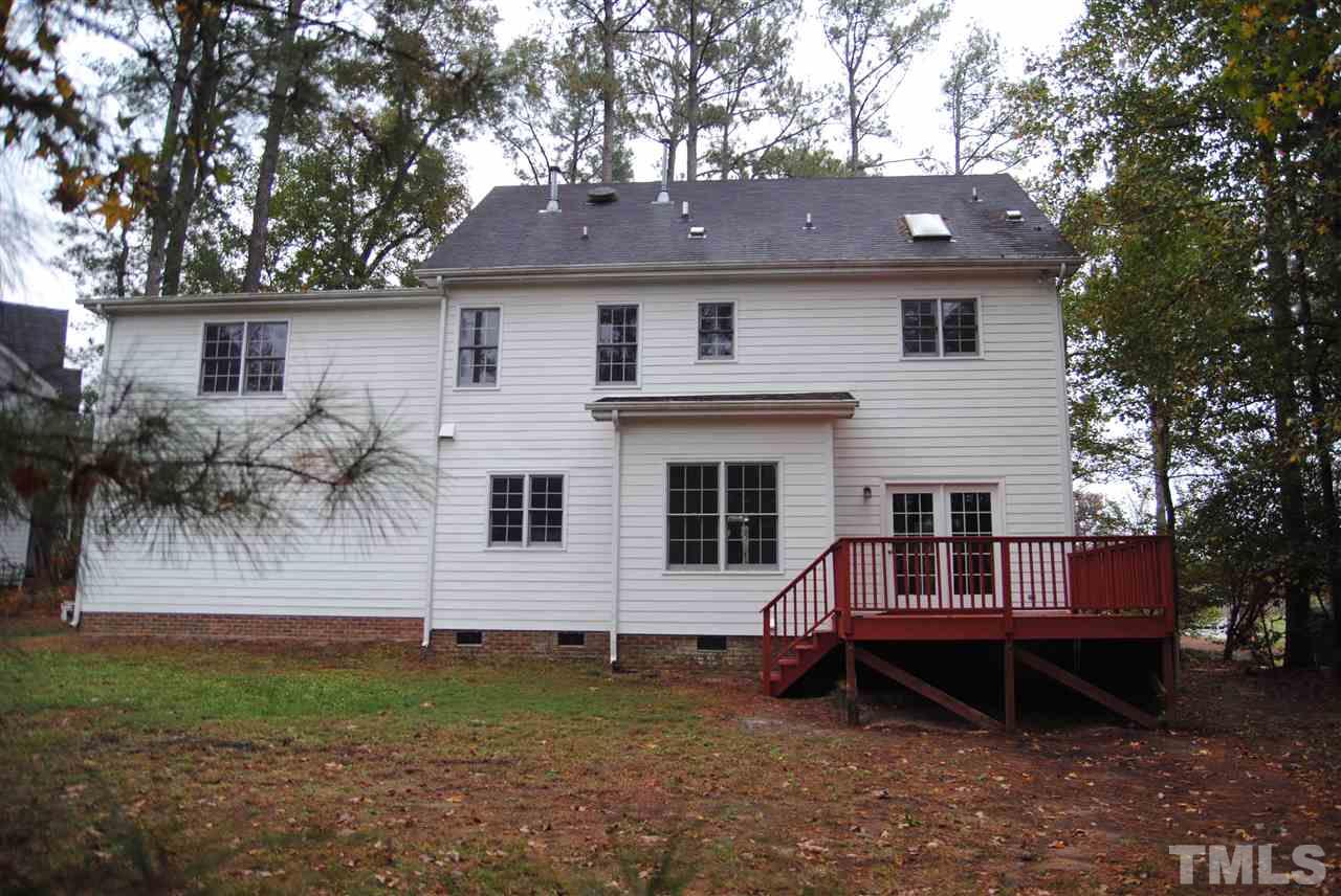 2004 Vintners Court Raleigh, NC 27610 - Photo 16 of 16 a view of house with a yard and a tree