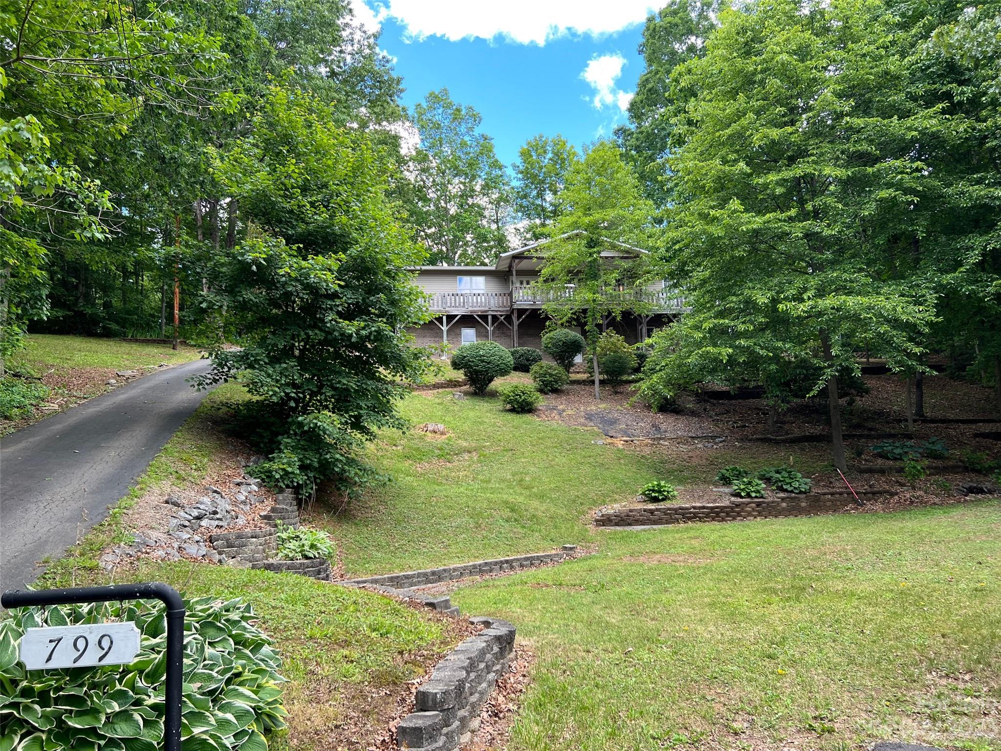 a view of a garden with a lake