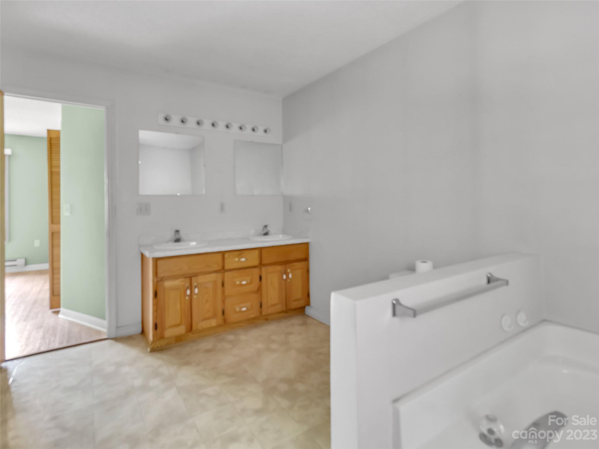 799 Nellie John Drive Clyde, NC 28721 - Photo 31 of 38 a view of utility room with closet