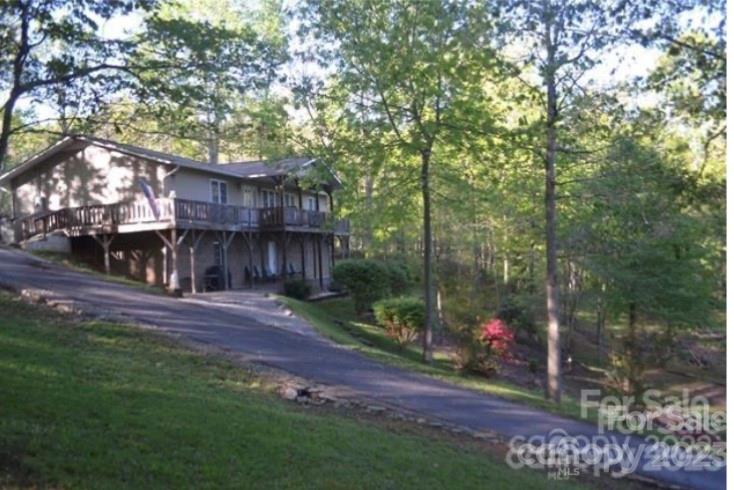 799 Nellie John Drive Clyde, NC 28721 - Photo 4 of 38 a view of a street with a large trees