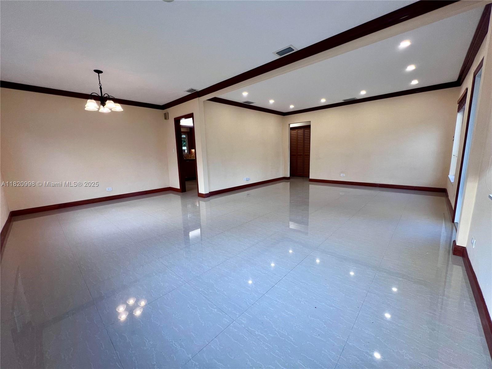 6225 Southwest 26th Street Miami, FL 33175 - Photo 4 of 10 a view of an empty room