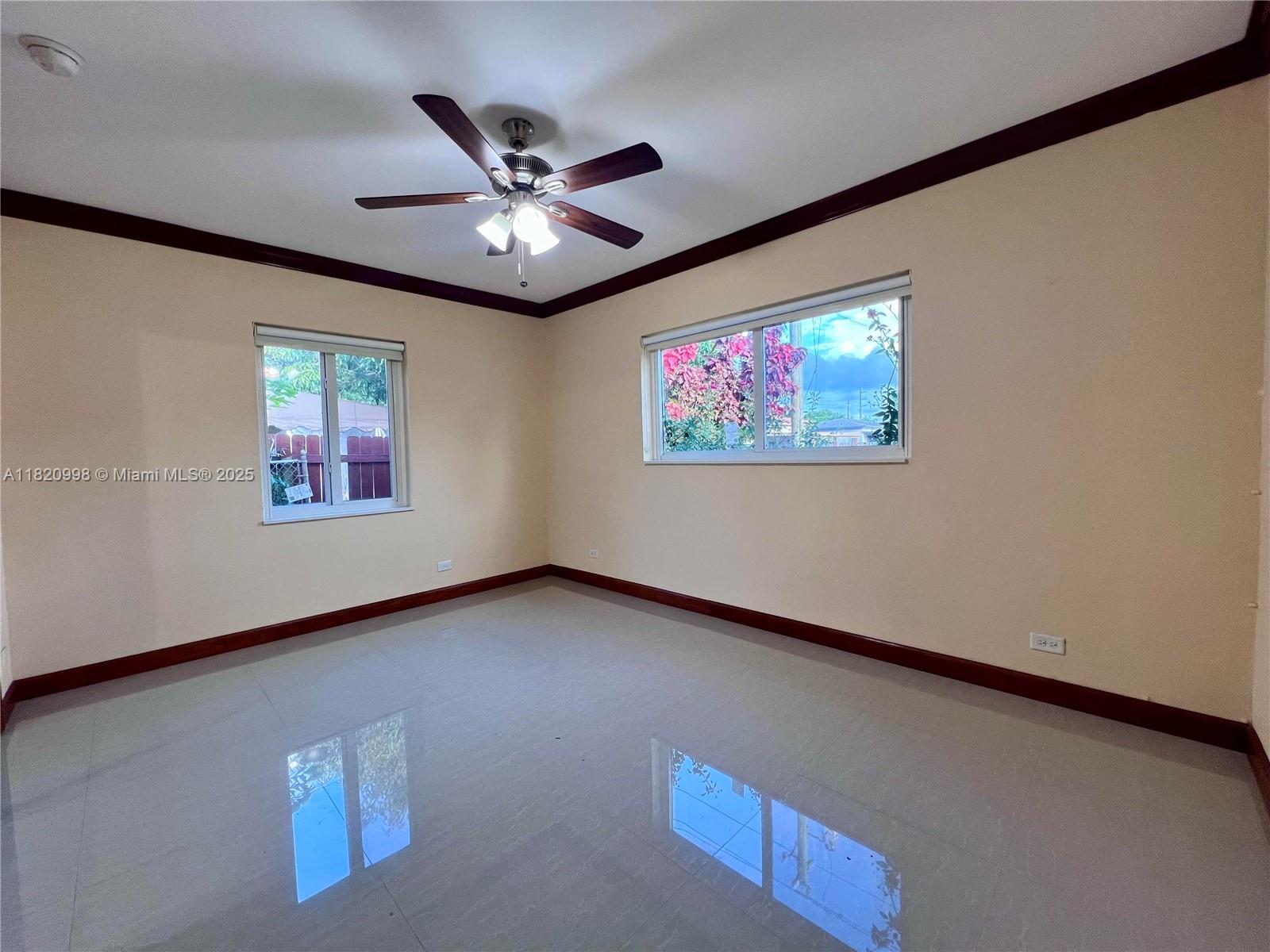 6225 Southwest 26th Street Miami, FL 33175 - Photo 7 of 10 a view of a hallway with a large window
