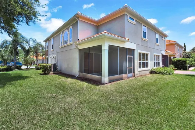 a view of a house with a yard