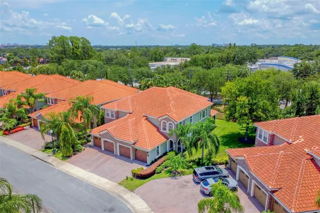 an aerial view of a house with a garden