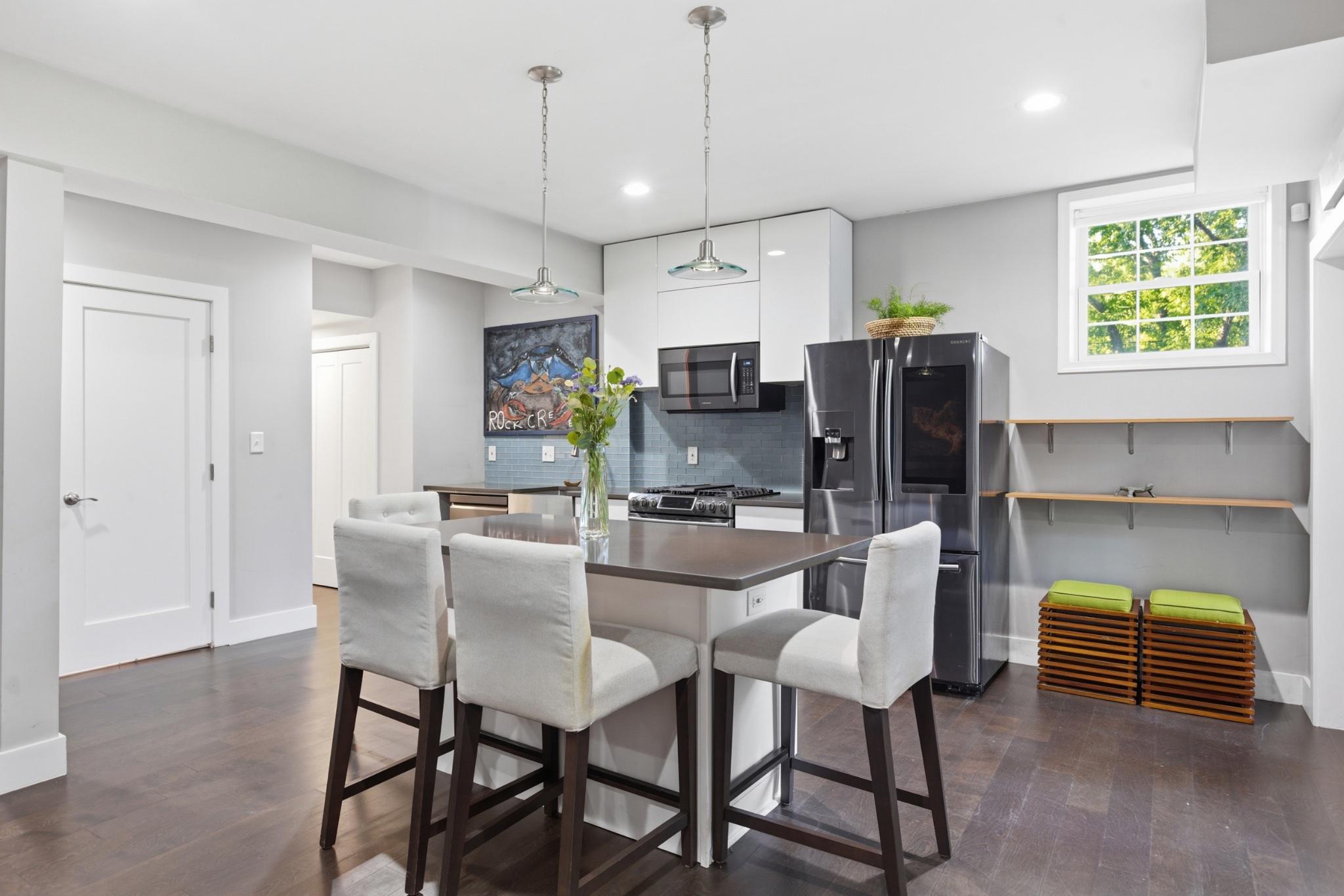 1219 Meadow View Road Pasadena, MD 21122 - Photo 45 of 70 Lower level modern kitchen with sleek design.