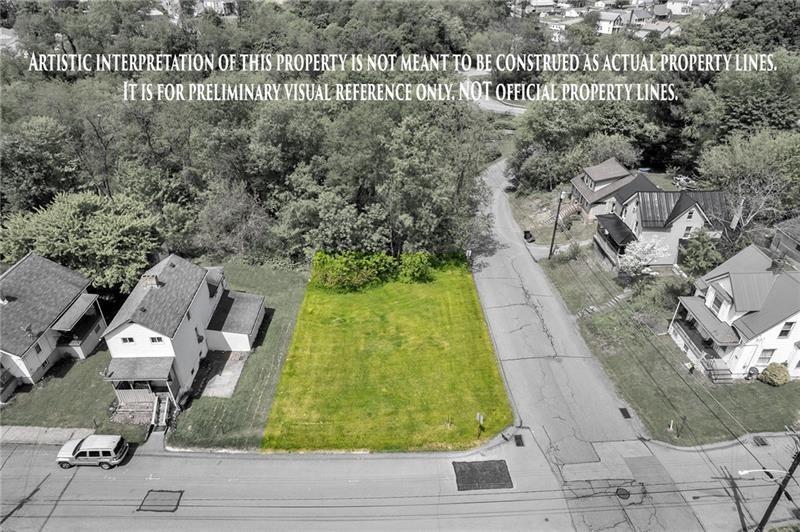 845 Walnut Street Rochester, PA 15074 - Photo 1 of 5 an aerial view of a house with a yard