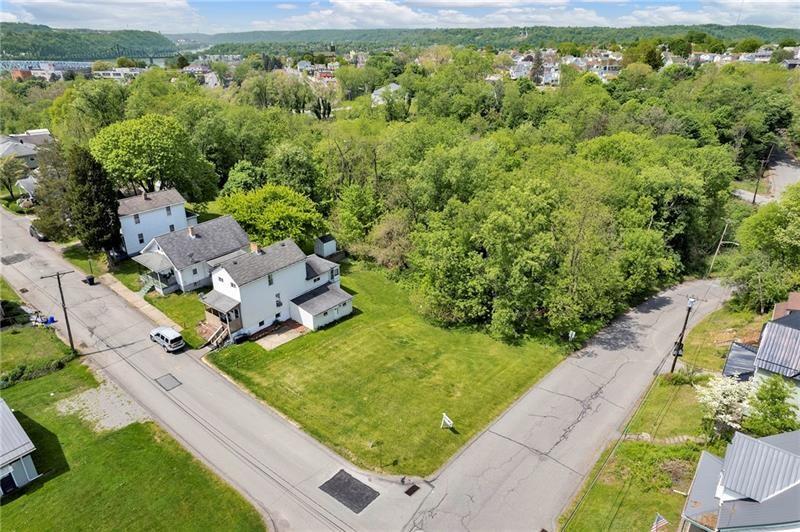 845 Walnut Street Rochester, PA 15074 - Photo 2 of 5 an aerial view of a house with a yard