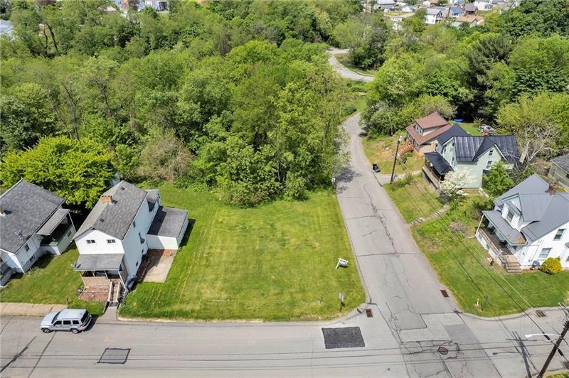 845 Walnut Street Rochester, PA 15074 - Photo 3 of 5 an aerial view of residential houses with yard