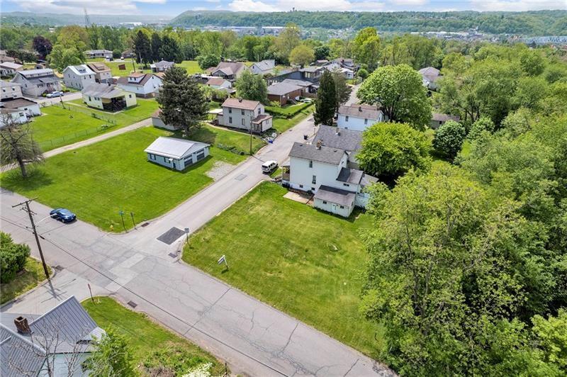 845 Walnut Street Rochester, PA 15074 - Photo 4 of 5 an aerial view of a house with garden space and street view