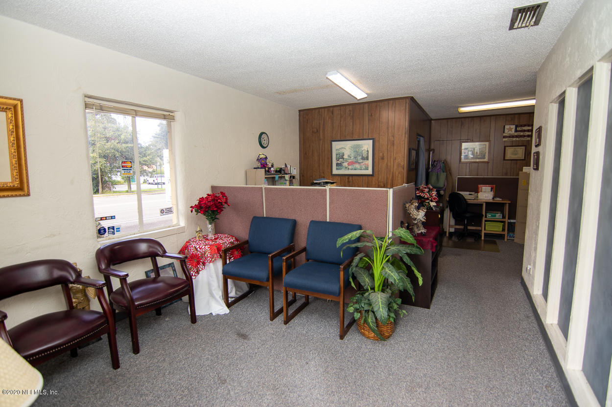 1701 Rogero Road Jacksonville, FL 32211 - Photo 15 of 20 a living room with furniture and a window