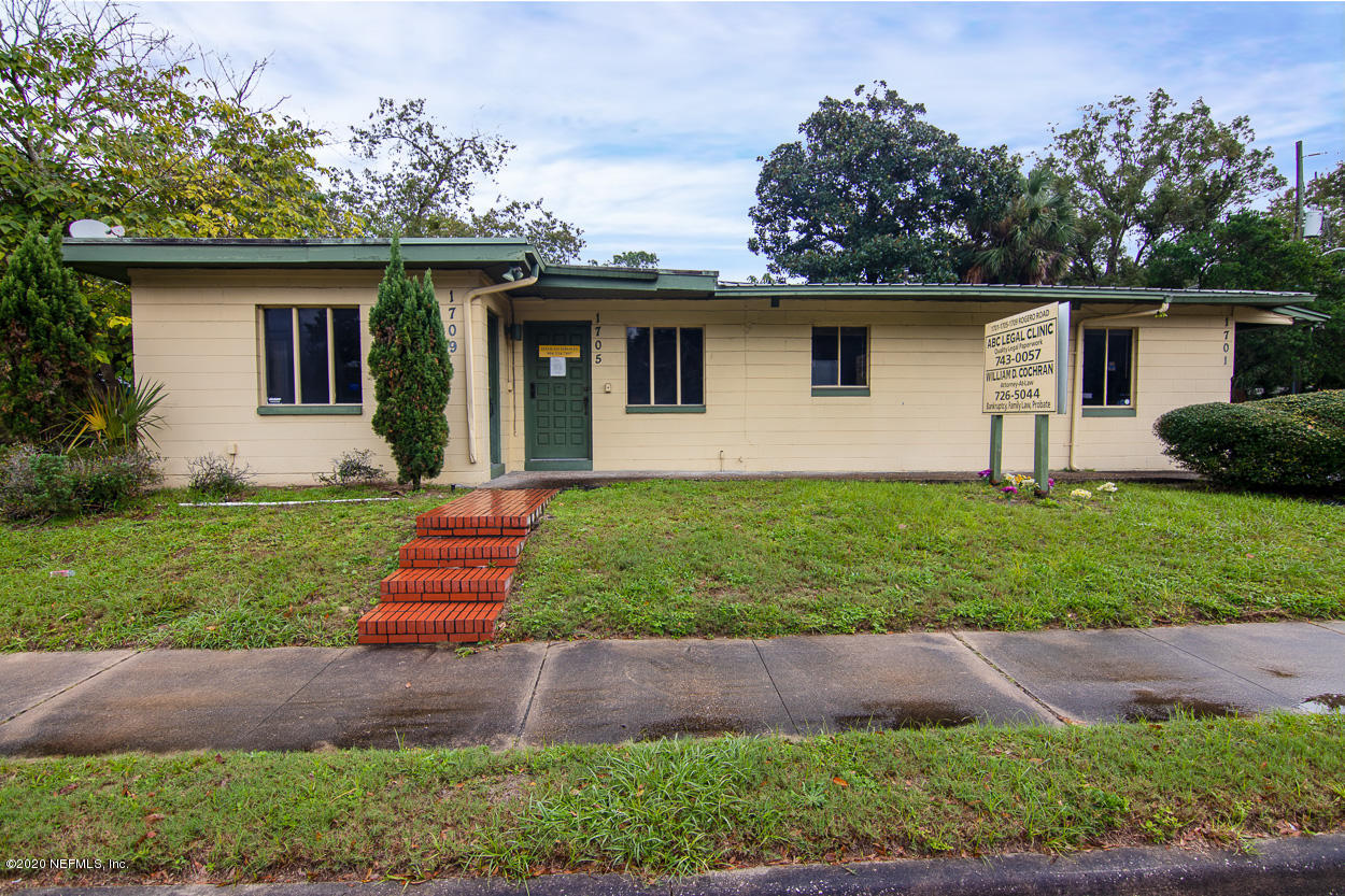 1701 Rogero Road Jacksonville, FL 32211 - Photo 2 of 20 a front view of house with yard and green space