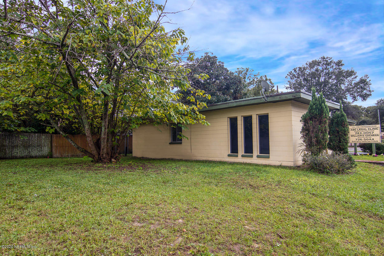 1701 Rogero Road Jacksonville, FL 32211 - Photo 4 of 20 a view of a house with a yard