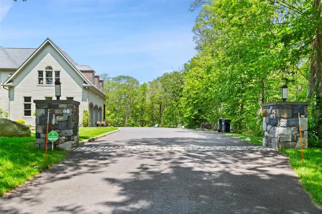 a view of a house with a street