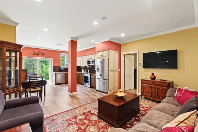 a kitchen with stainless steel appliances granite countertop a stove top oven and sink