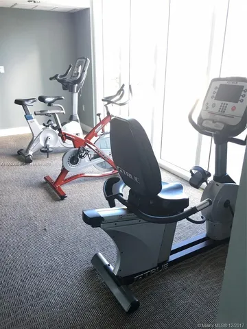 a view of a living room and dining room
