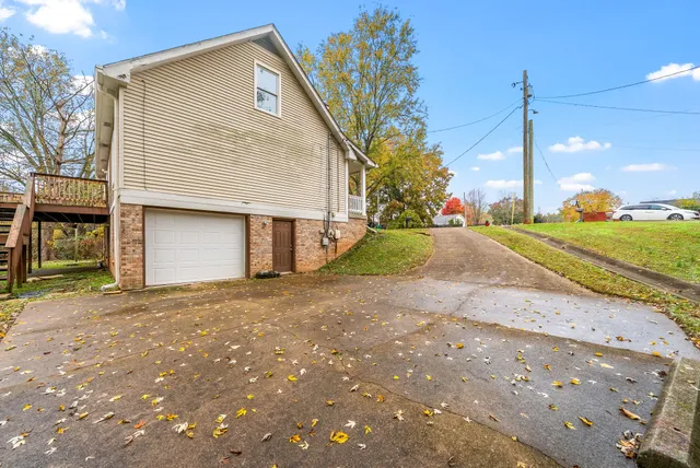 a view of a house with a street