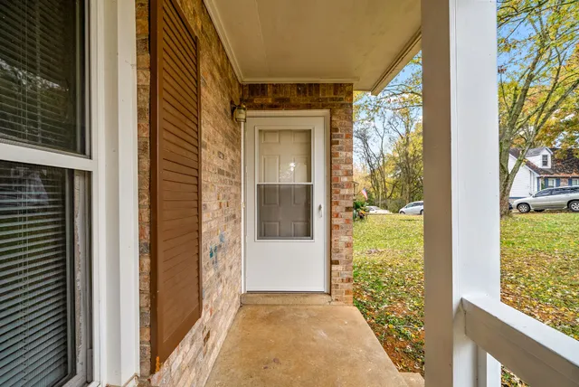 a view of a glass door with a outdoor space