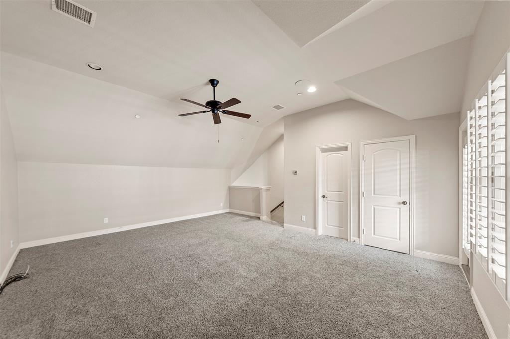 7929 Maddox Road Plano, TX 75024 - Photo 19 of 26 The 3rd level has endless possibilities featuring a half bath, plantation shutters and covered private outdoor space.