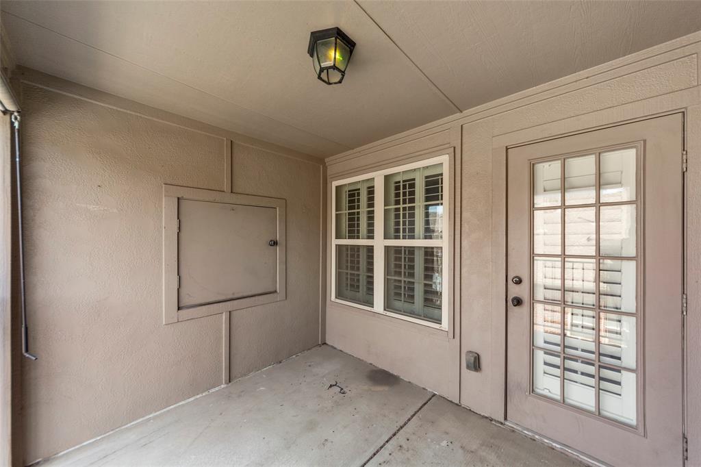 7929 Maddox Road Plano, TX 75024 - Photo 23 of 26 Entrance to property with a patio area and stucco siding