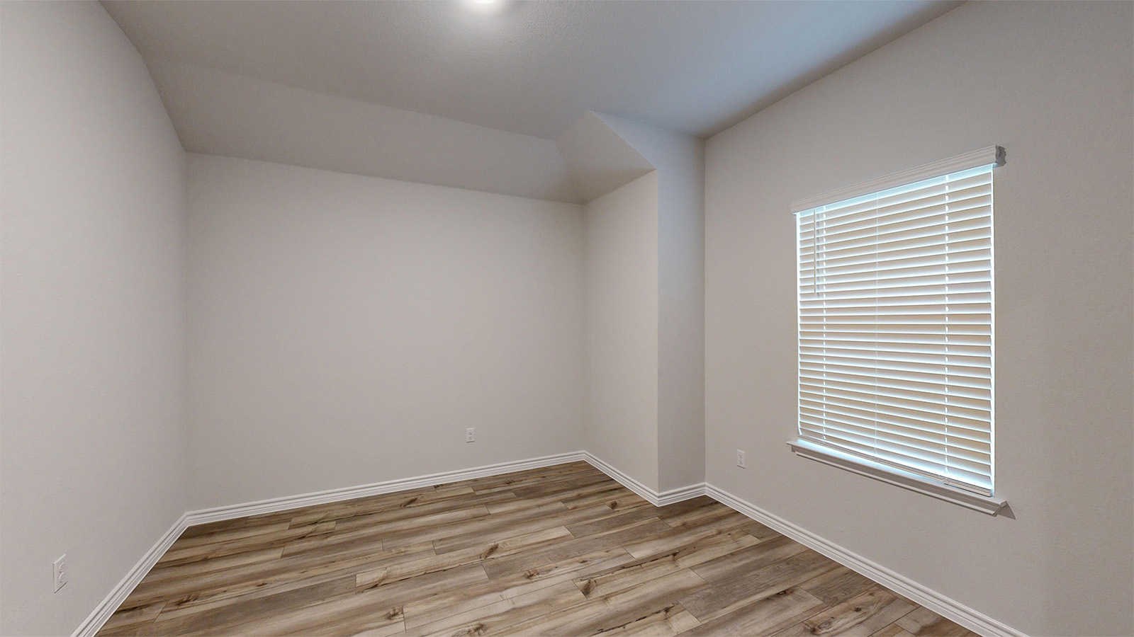 700 Gauge Road Thorndale, TX 76577 - Photo 9 of 22 Empty room with light wood-style flooring and baseboards