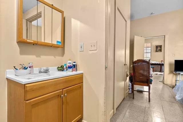 a utility room with a sink dryer and washer
