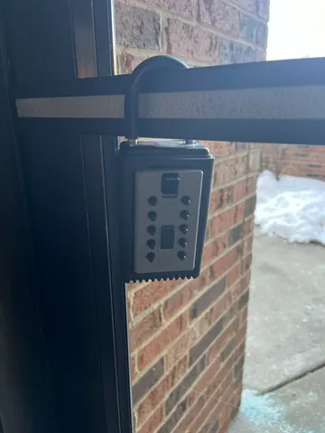 a bathroom with a shower and a sink
