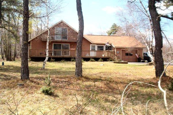 2403 Clover Road Long Pond, PA 18334 - Photo 1 of 1 a front view of house with yard covered in snow