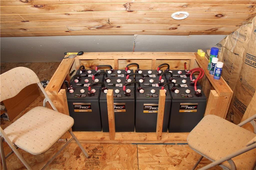 184 Ledge View Road West Forks, ME 04985 - Photo 20 of 49 Large battery bank that will power...