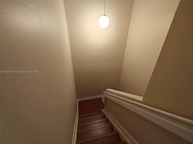 a view of small space with wooden floor