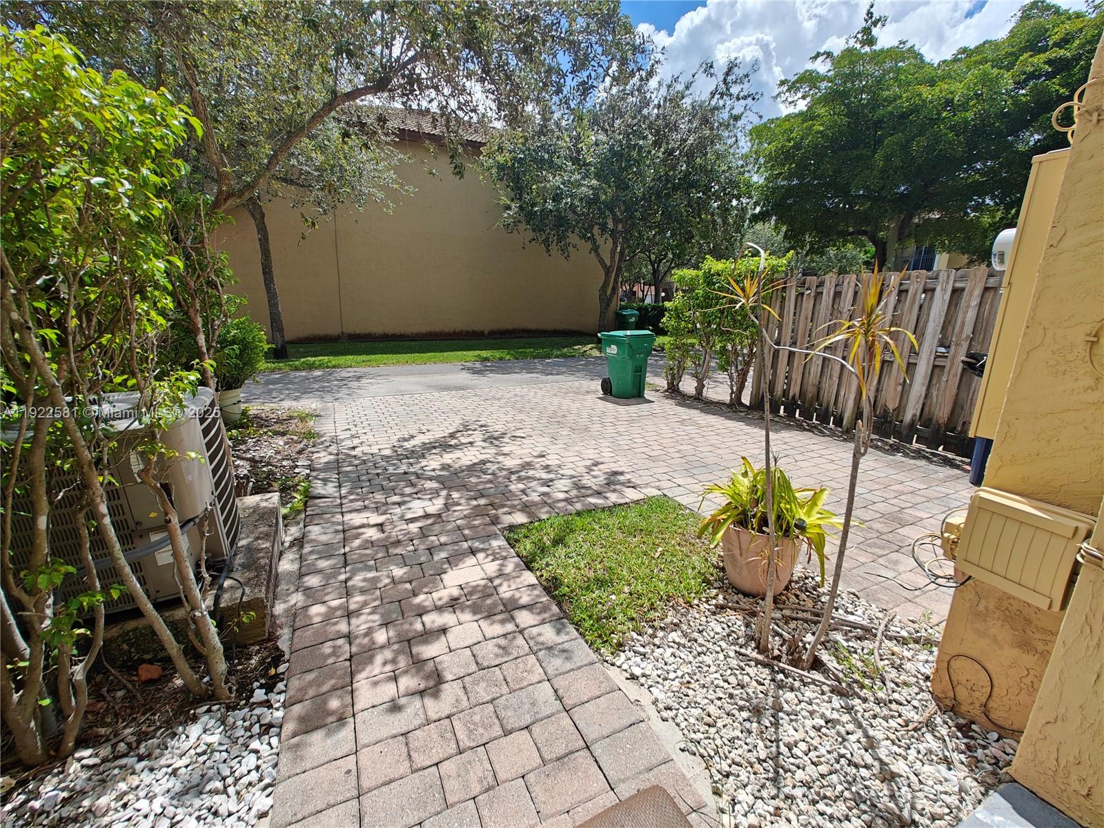 11252 Southwest 230th Terrace, Unit 11252 Miami, FL 33170 - Photo 27 of 28 a view of a backyard with sitting area