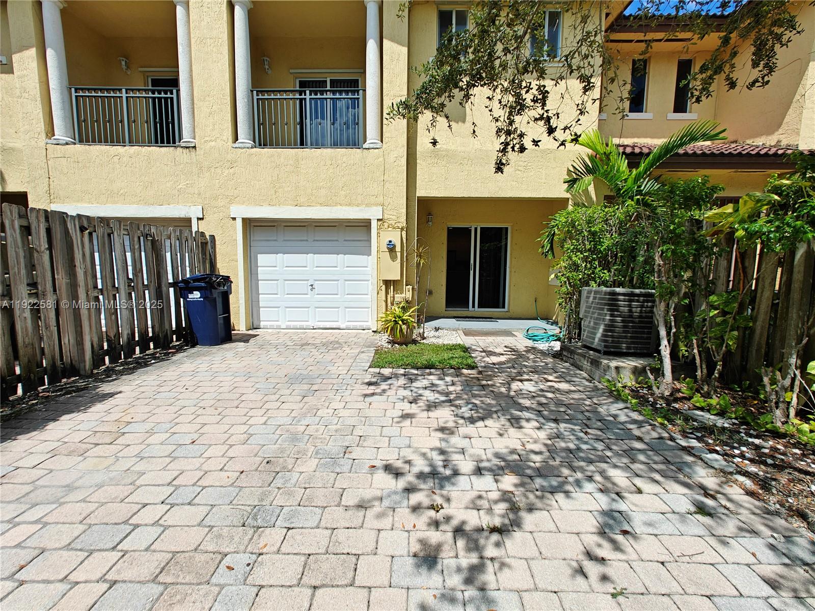 11252 Southwest 230th Terrace, Unit 11252 Miami, FL 33170 - Photo 28 of 28 a view of a house with backyard and trees