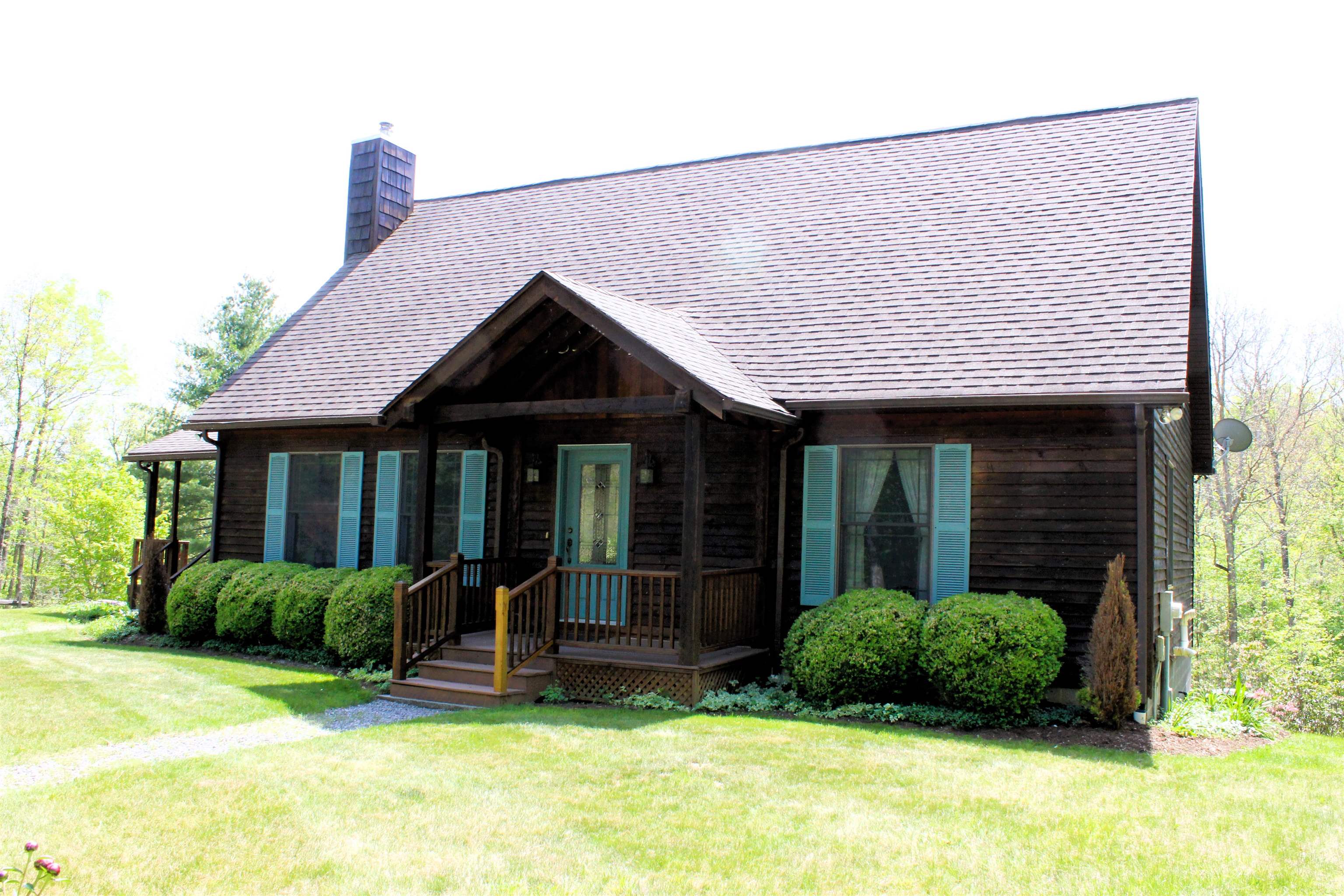 625 Hummingbird Lane Monterey, VA 24465 - Photo 2 of 65 a view of a house with backyard porch and furniture