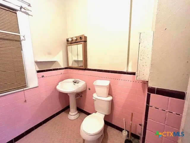 a view of hallway with walk in closet