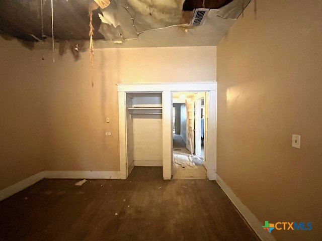 206 Hinton Street Three Rivers, TX 78071 - Photo 24 of 34 a view of a room with wooden floor