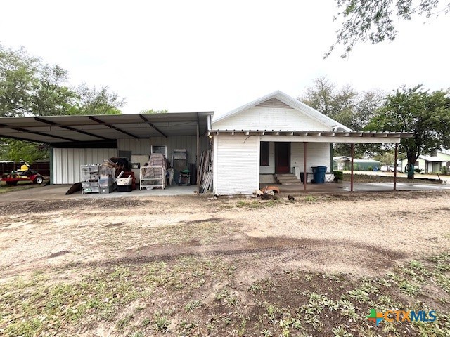 206 Hinton Street Three Rivers, TX 78071 - Photo 6 of 34 a view of a house with cars park