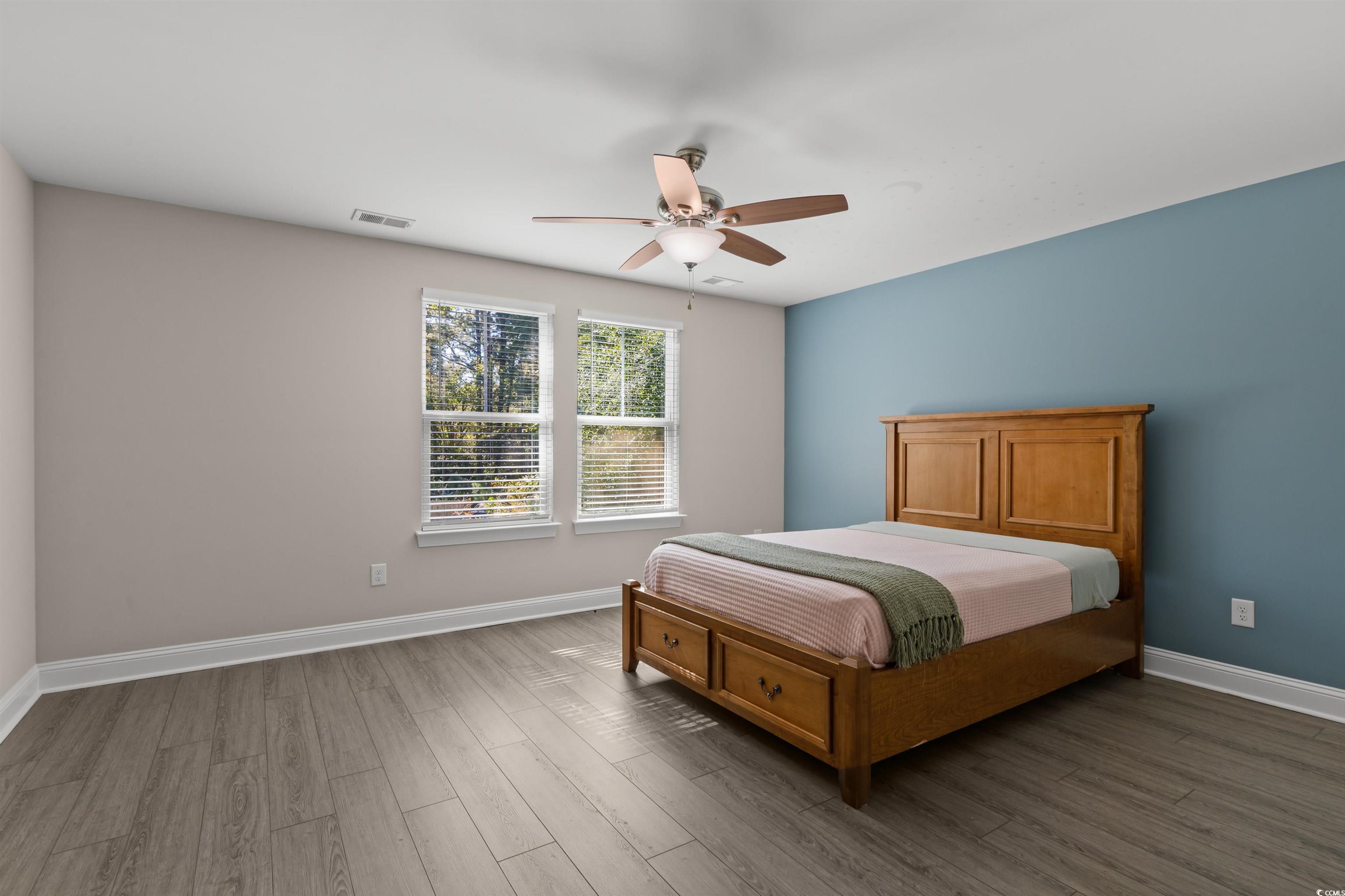 3780 Dewitt Road Longs, SC 29568 - Photo 32 of 40 Bedroom with wood finished floors and ceiling fan