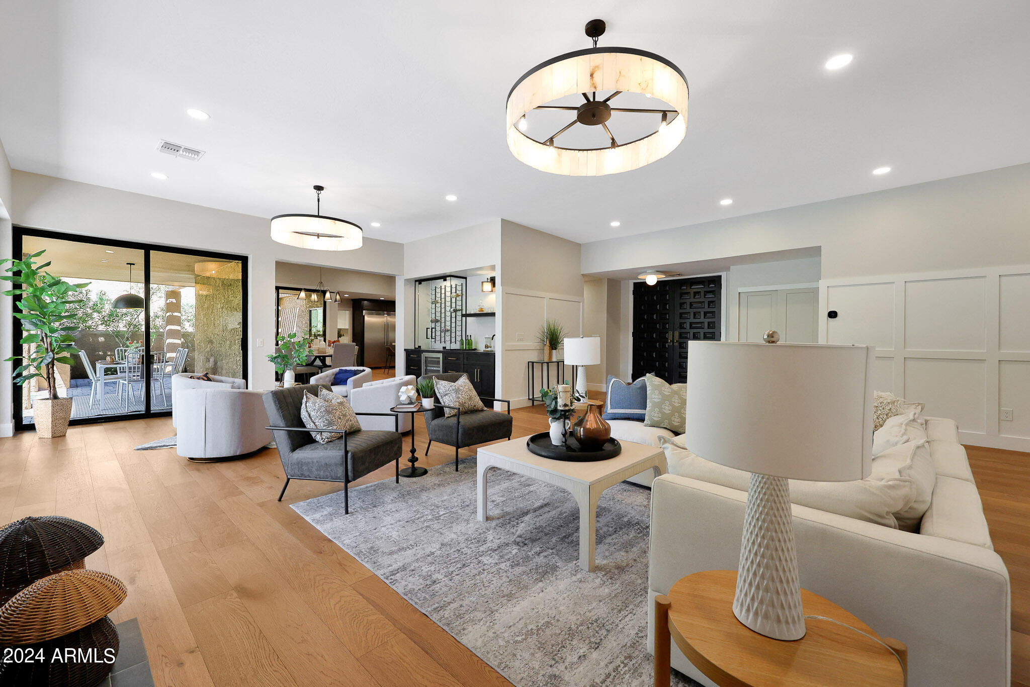 4440 East Camelback Road, Unit 32 Phoenix, AZ 85018 - Photo 14 of 54 a living room with furniture and a large window