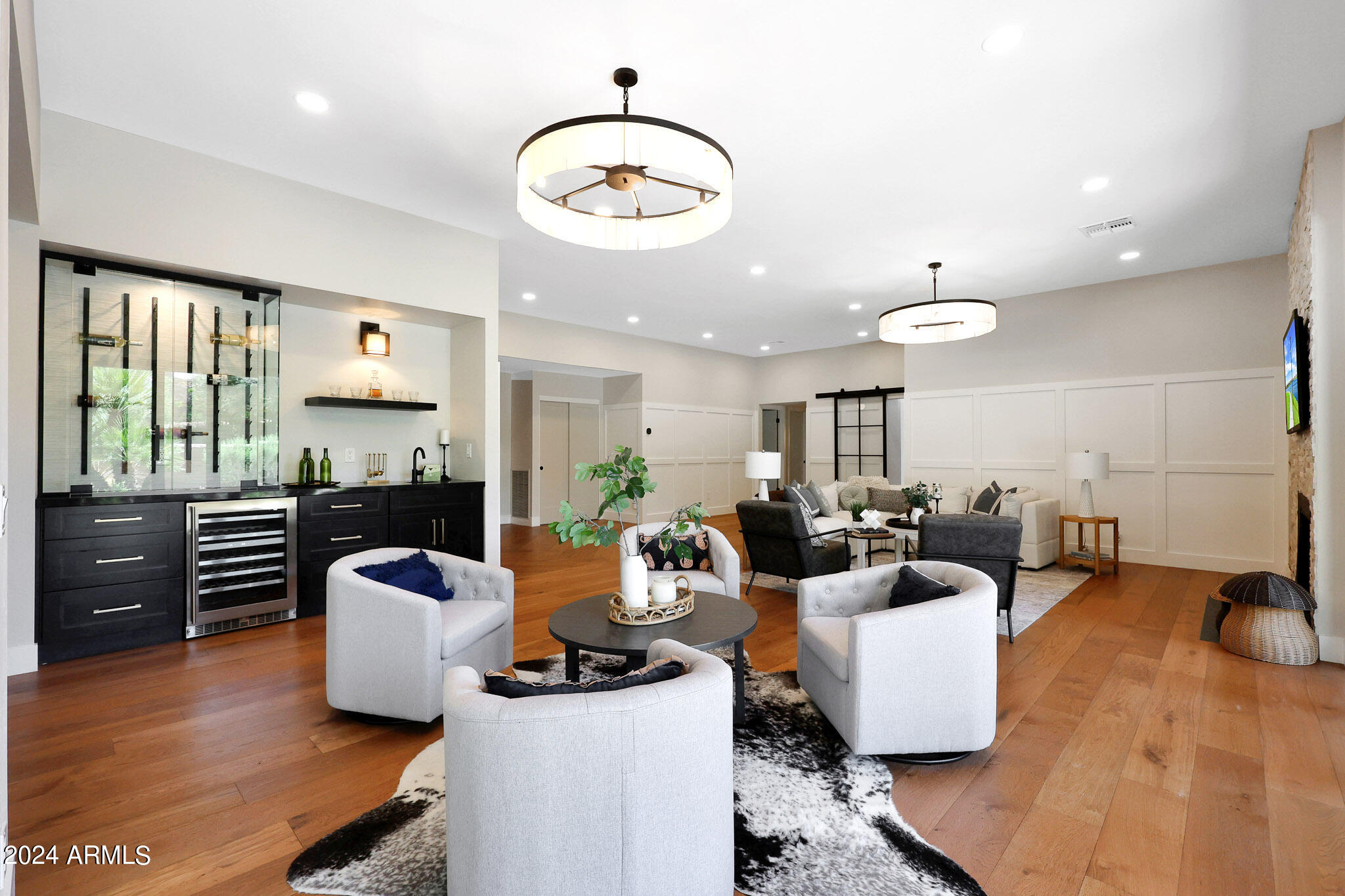 4440 East Camelback Road, Unit 32 Phoenix, AZ 85018 - Photo 15 of 54 a living room with furniture and wooden floor