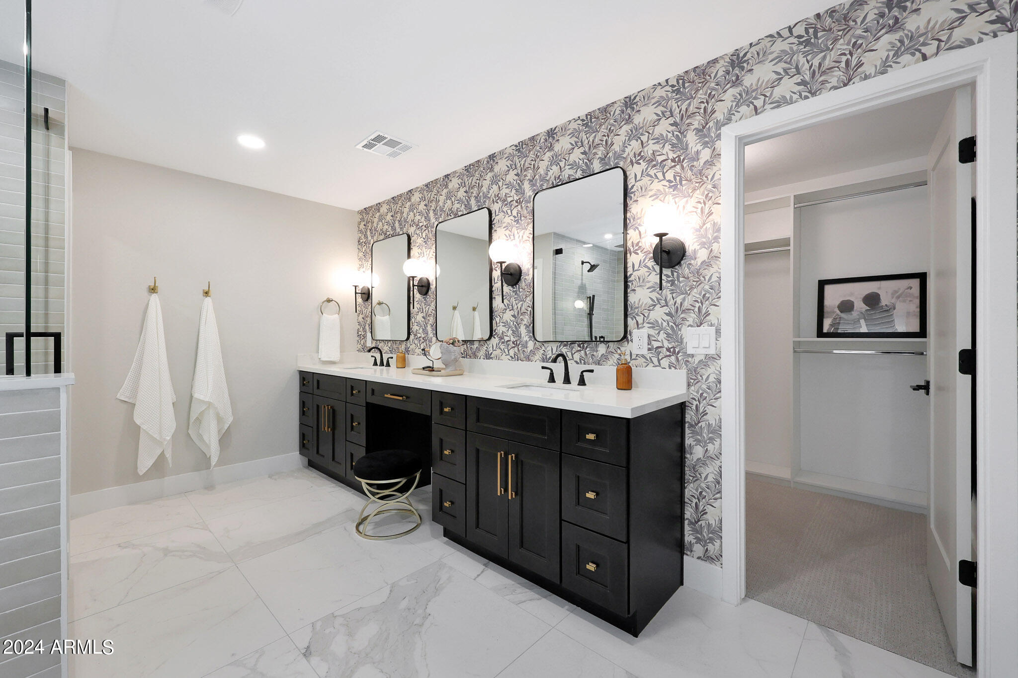 4440 East Camelback Road, Unit 32 Phoenix, AZ 85018 - Photo 32 of 54 a spacious bathroom with a double vanity sink and a mirror