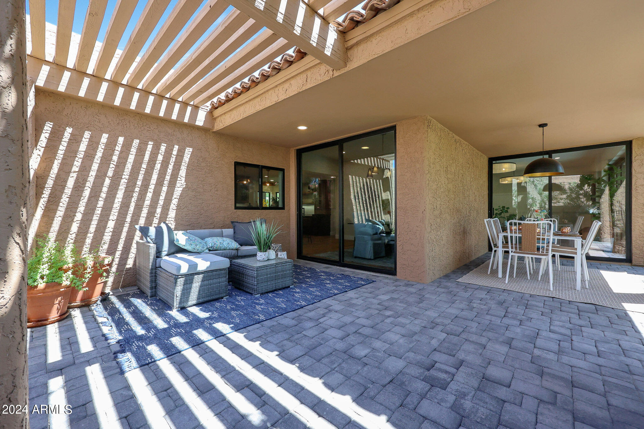 4440 East Camelback Road, Unit 32 Phoenix, AZ 85018 - Photo 49 of 54 a living room with furniture