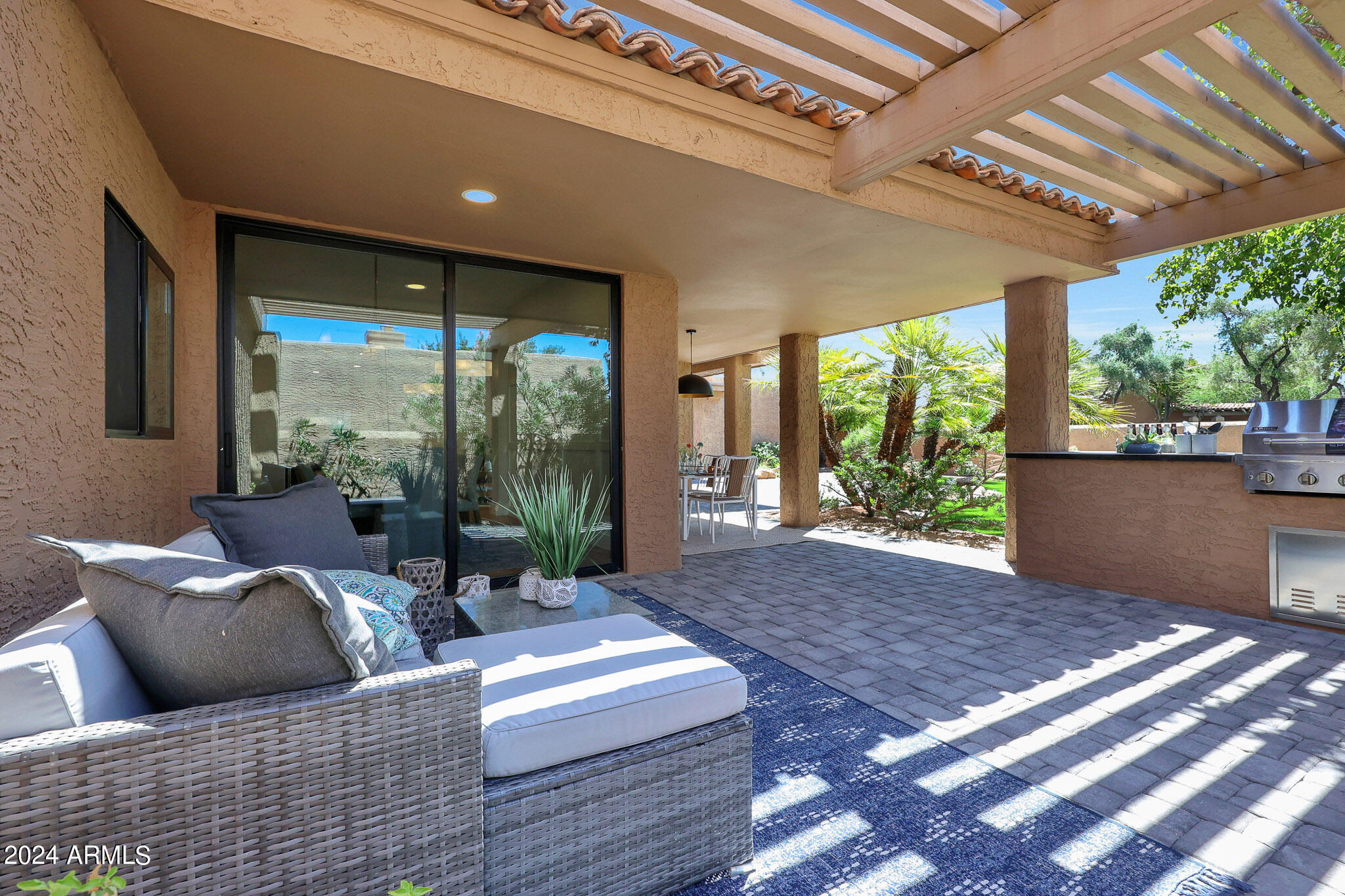 4440 East Camelback Road, Unit 32 Phoenix, AZ 85018 - Photo 50 of 54 a living room with couch