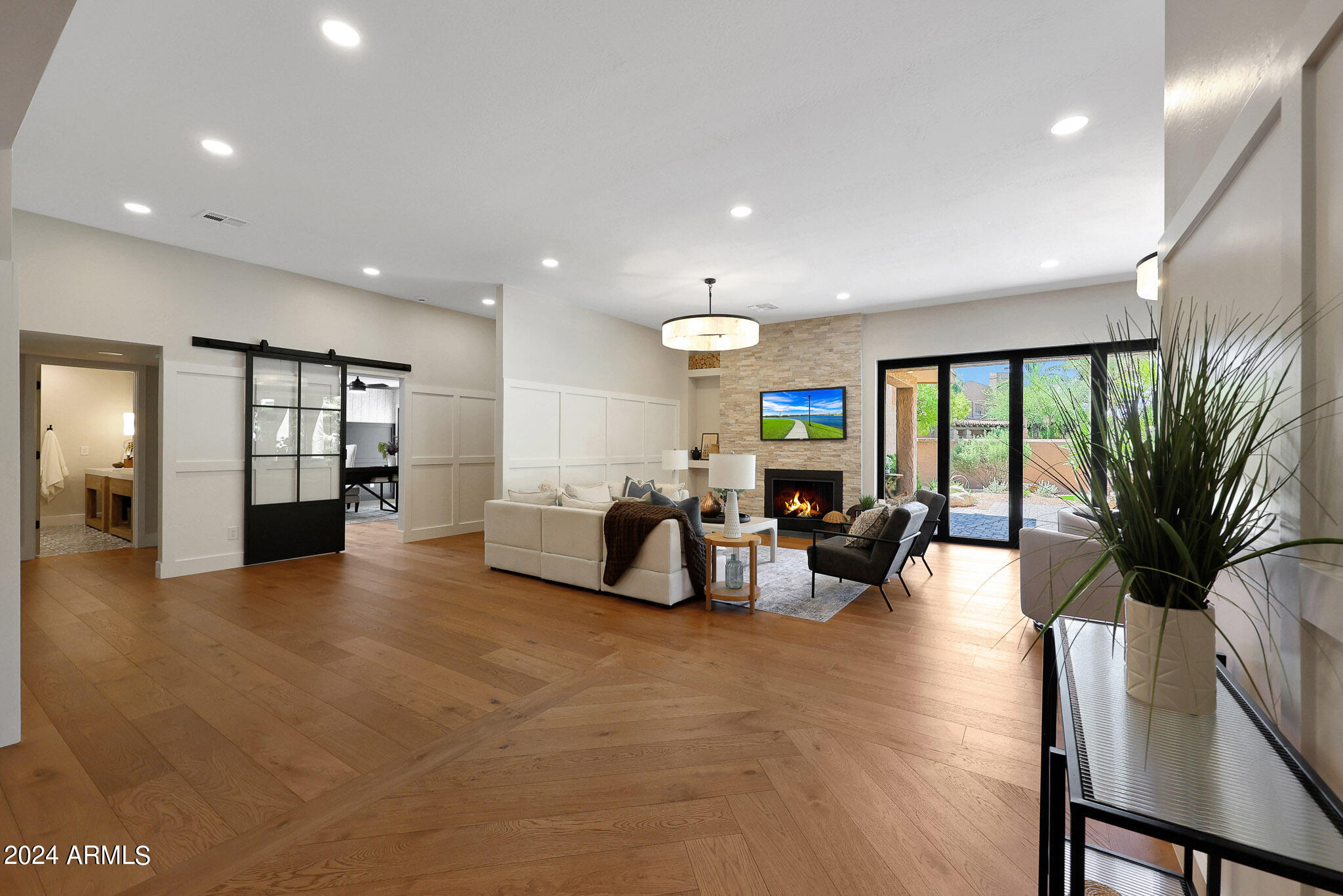 4440 East Camelback Road, Unit 32 Phoenix, AZ 85018 - Photo 10 of 54 a lobby with furniture and floor to ceiling window
